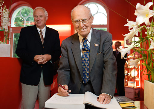 Norman Borlaug signing the guest book